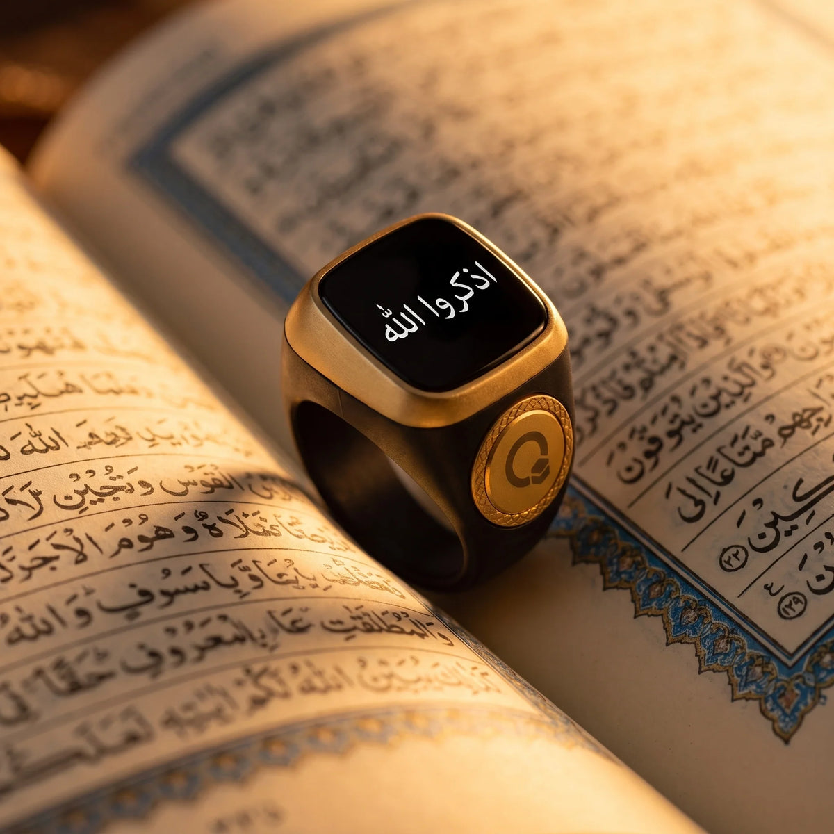 Nooraya Smart Zikr Ring resting on Quran