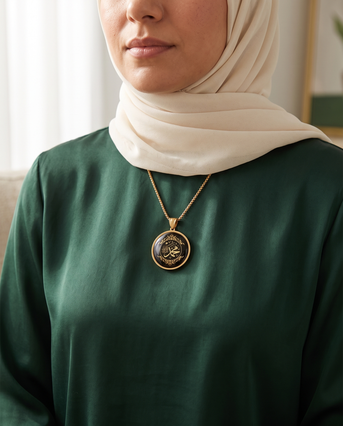 Floral Allah glass medallion necklace worn with modest clothing