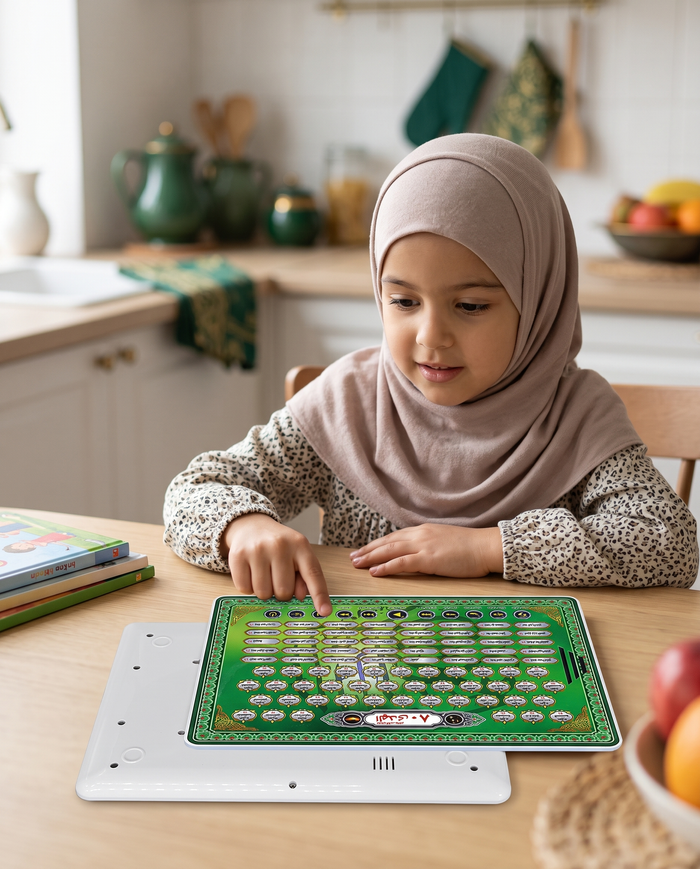 Child learning Arabic with the Nooraya Quran tablet